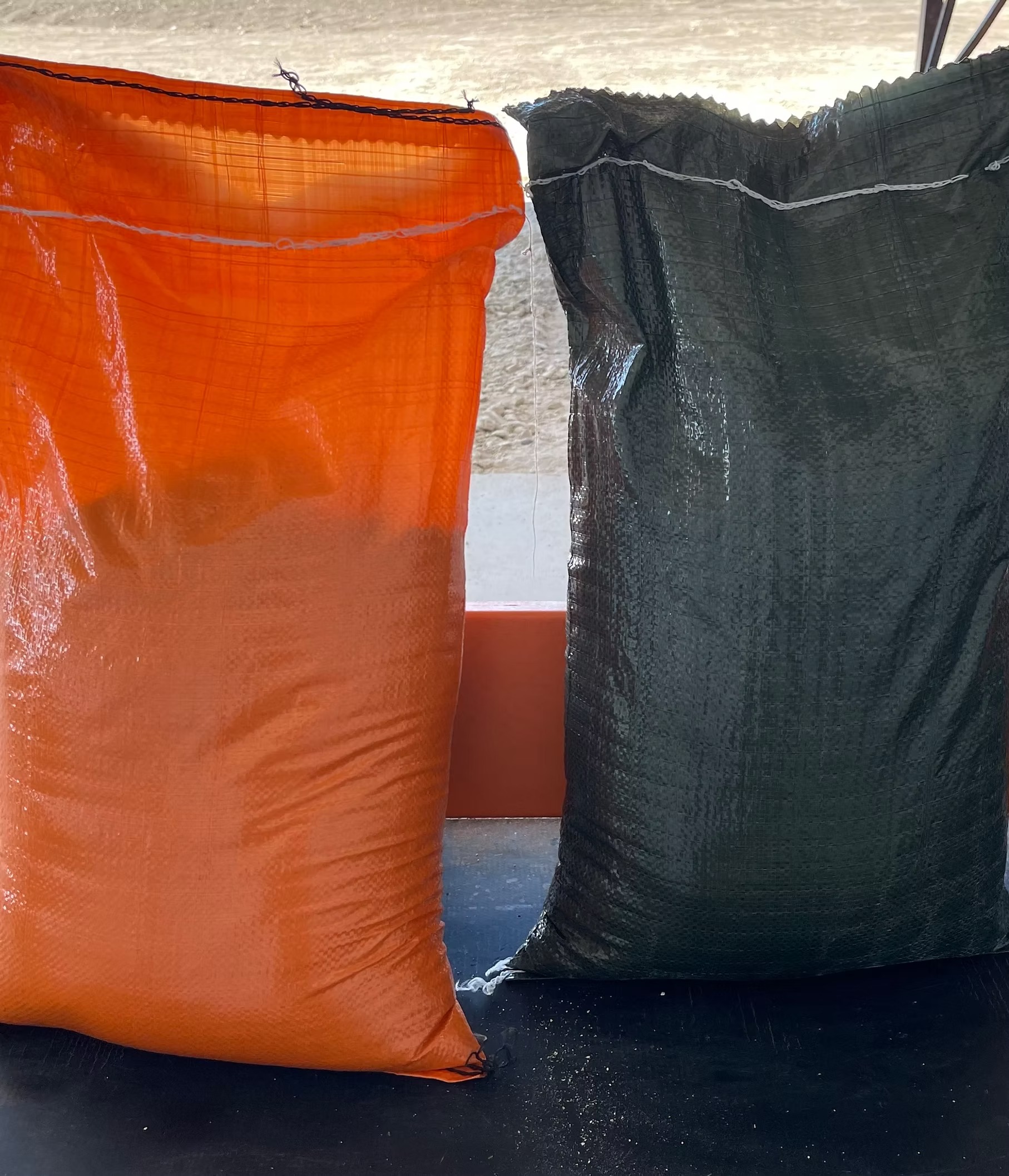 Orange and black custom sandbags close up